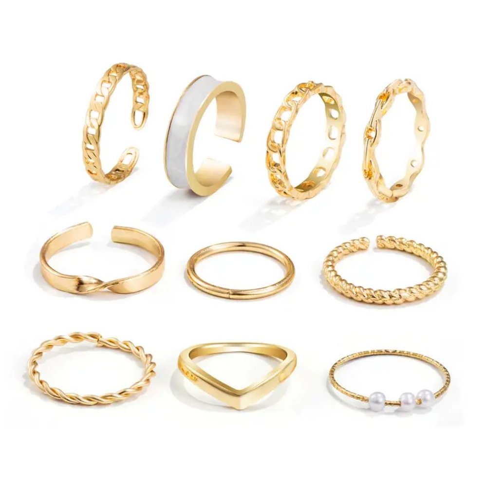10 golden Rings -for ladies   no markings   ..  r15 NWOT